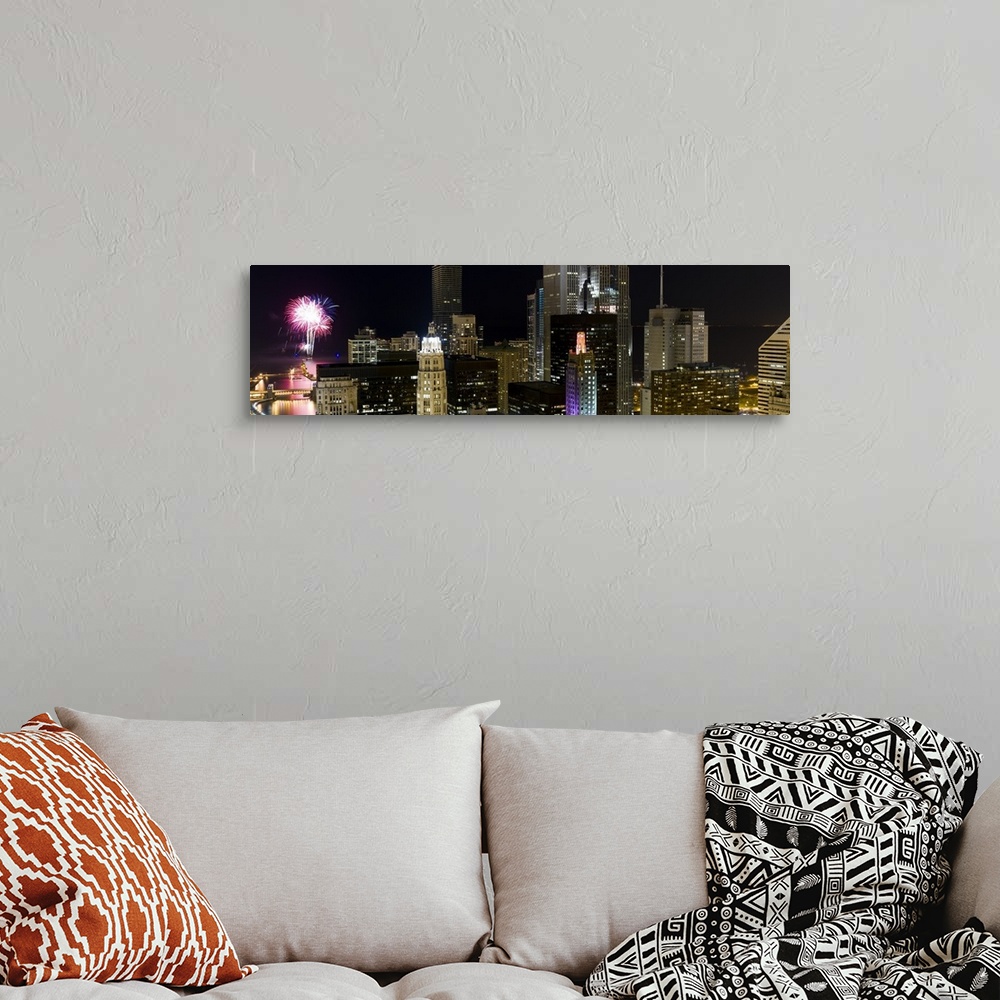 A bohemian room featuring Skyscrapers and firework display in a city at night, Lake Michigan, Chicago, Illinois,