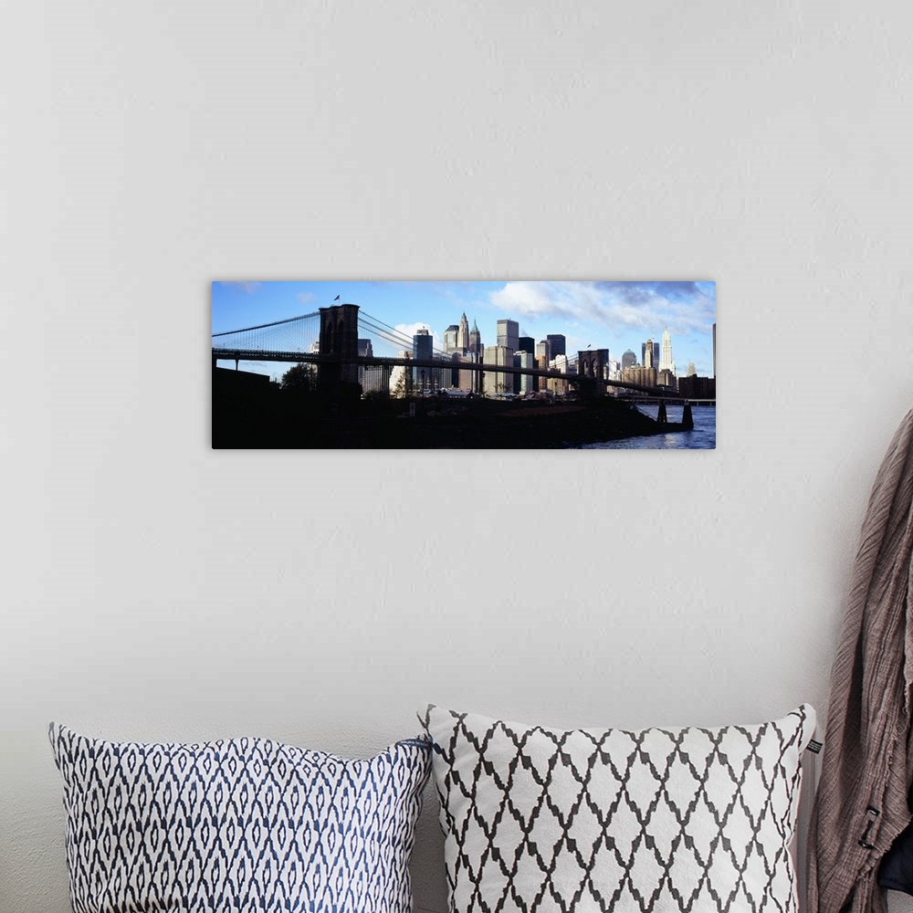 A bohemian room featuring Skyscrapers at the waterfront, Brooklyn Bridge, East River, Manhattan, New York City, New York State