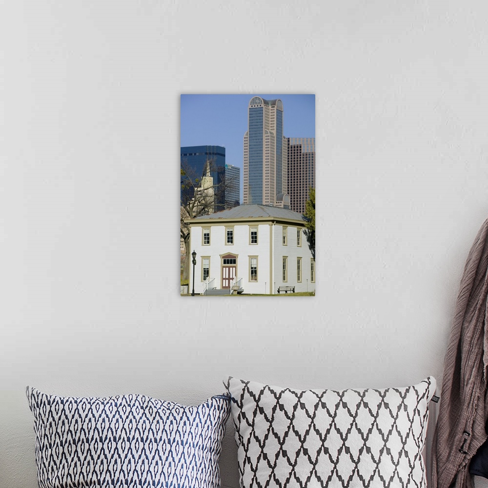 A bohemian room featuring Skyscrapers behind an old house, Old City Park, Dallas, Texas