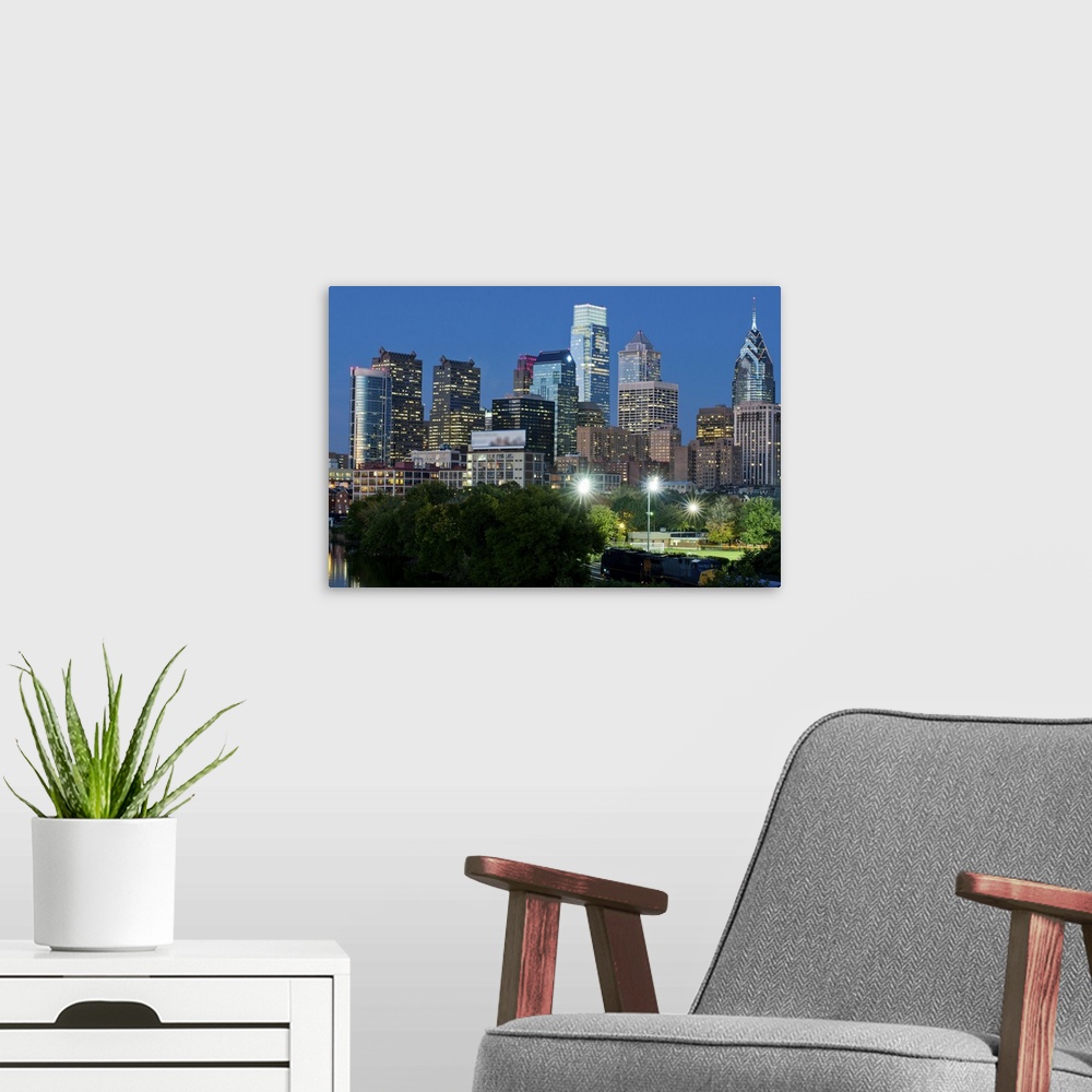 A modern room featuring Skyscrapers in a city at dusk, Philadelphia, Pennsylvania, USA