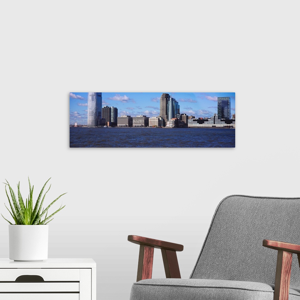 A modern room featuring Skyscrapers in a city, Jersey City, New Jersey, New York City, New York State