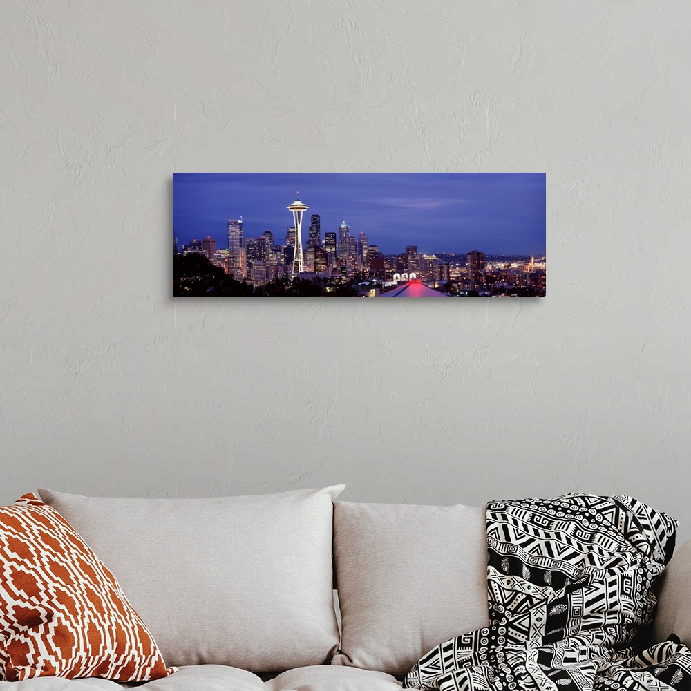 A bohemian room featuring Large panoramic photograph of downtown Seattle, Washington (WA). The Space Needle and many skyscr...