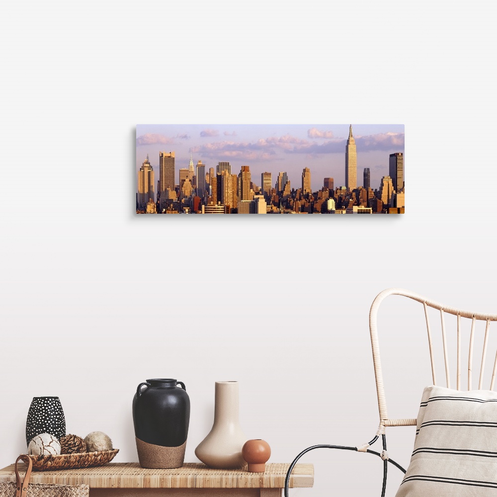 A farmhouse room featuring Panoramic photograph of the "Big Apple" skyline under cloudy skies.