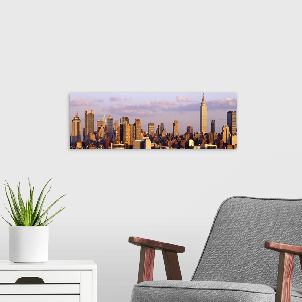 A modern room featuring Panoramic photograph of the "Big Apple" skyline under cloudy skies.