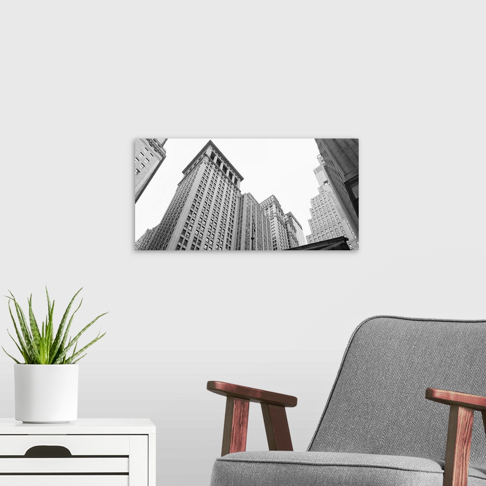 A modern room featuring Skyscrapers in a city, Wall Street, Lower Manhattan, Manhattan, New York City, New York State,