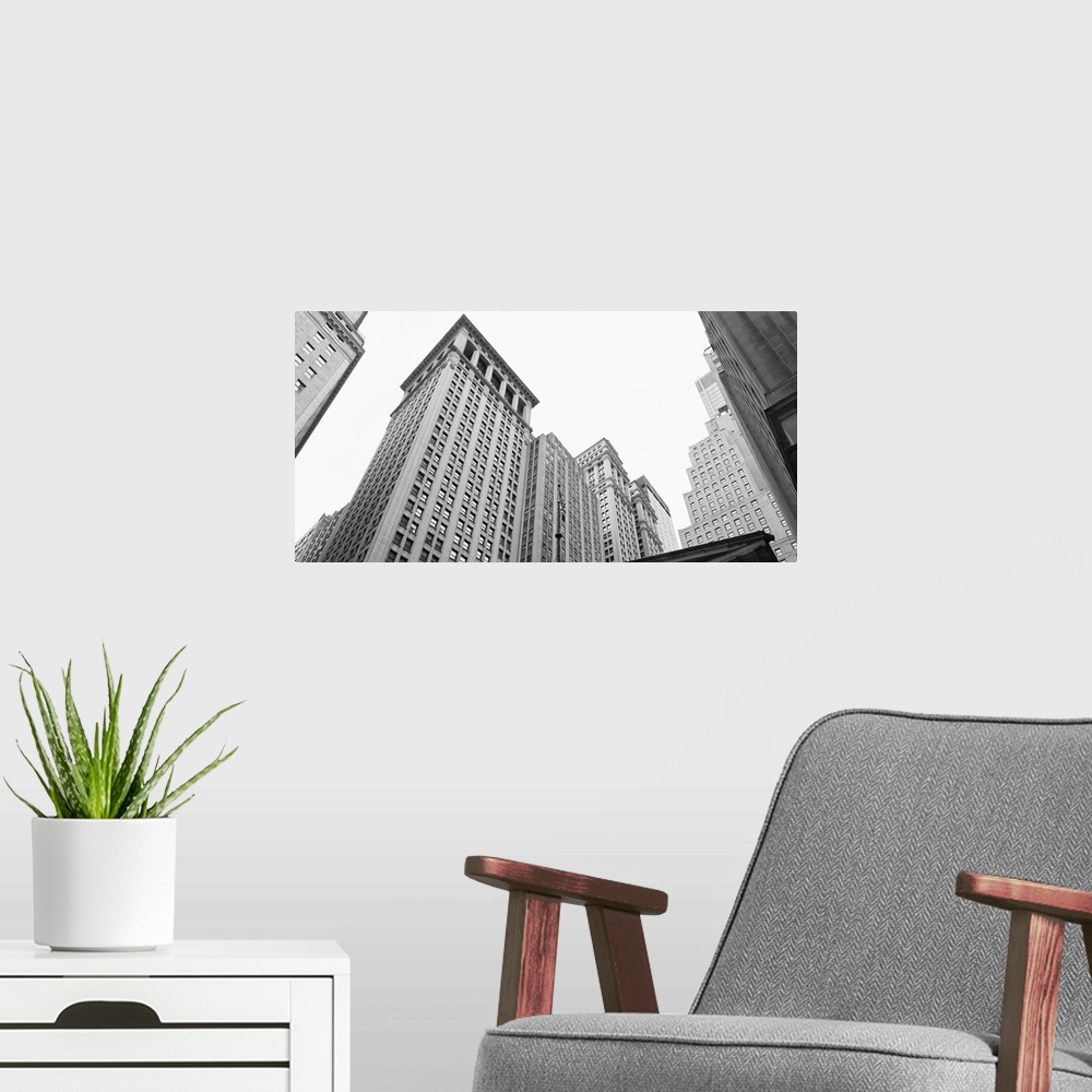 A modern room featuring Skyscrapers in a city, Wall Street, Lower Manhattan, Manhattan, New York City, New York State,