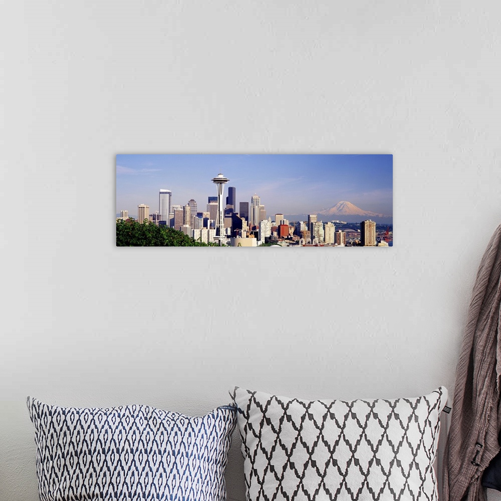 A bohemian room featuring This panoramic wall art is a photograph that has captured the vast city skyline.
