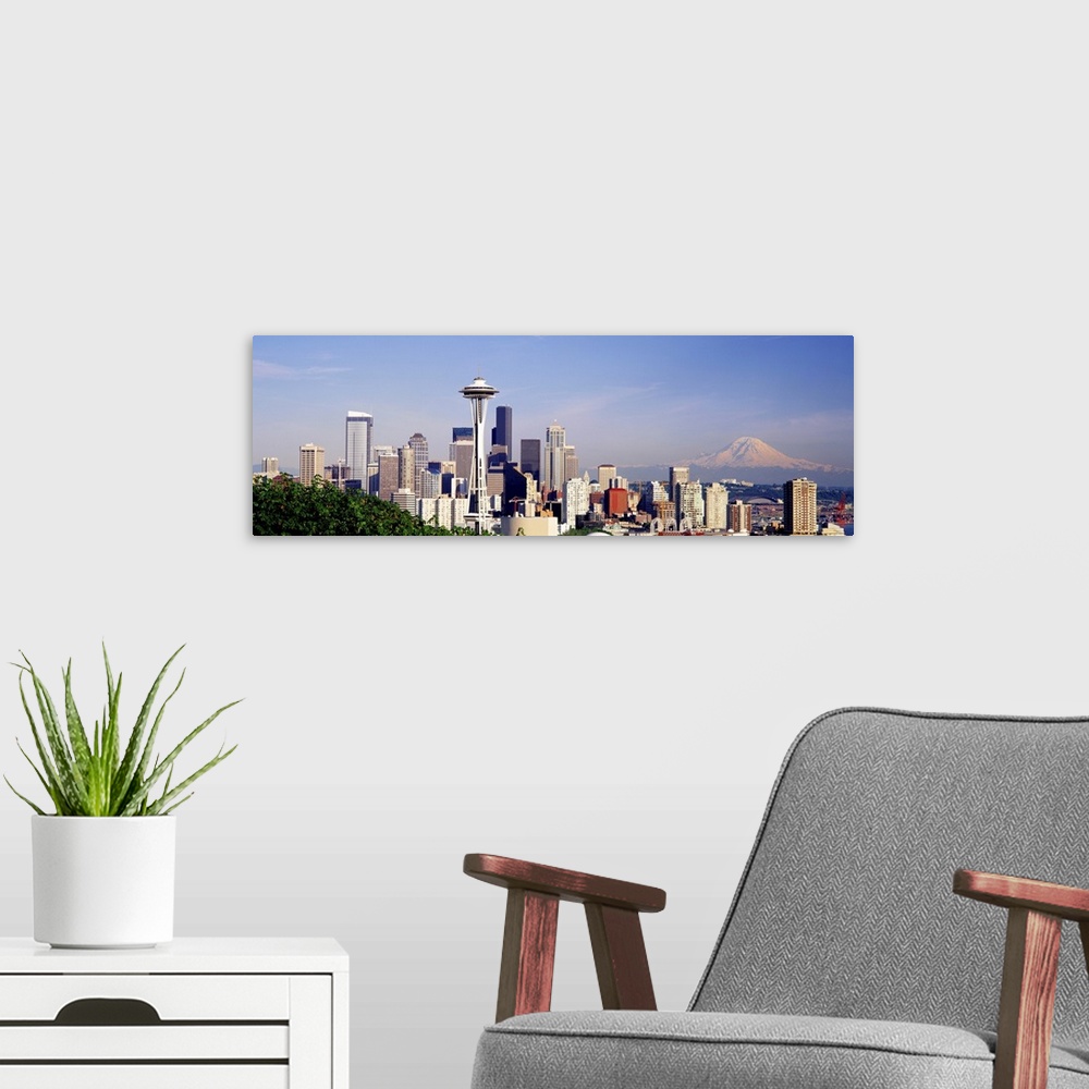 A modern room featuring This panoramic wall art is a photograph that has captured the vast city skyline.