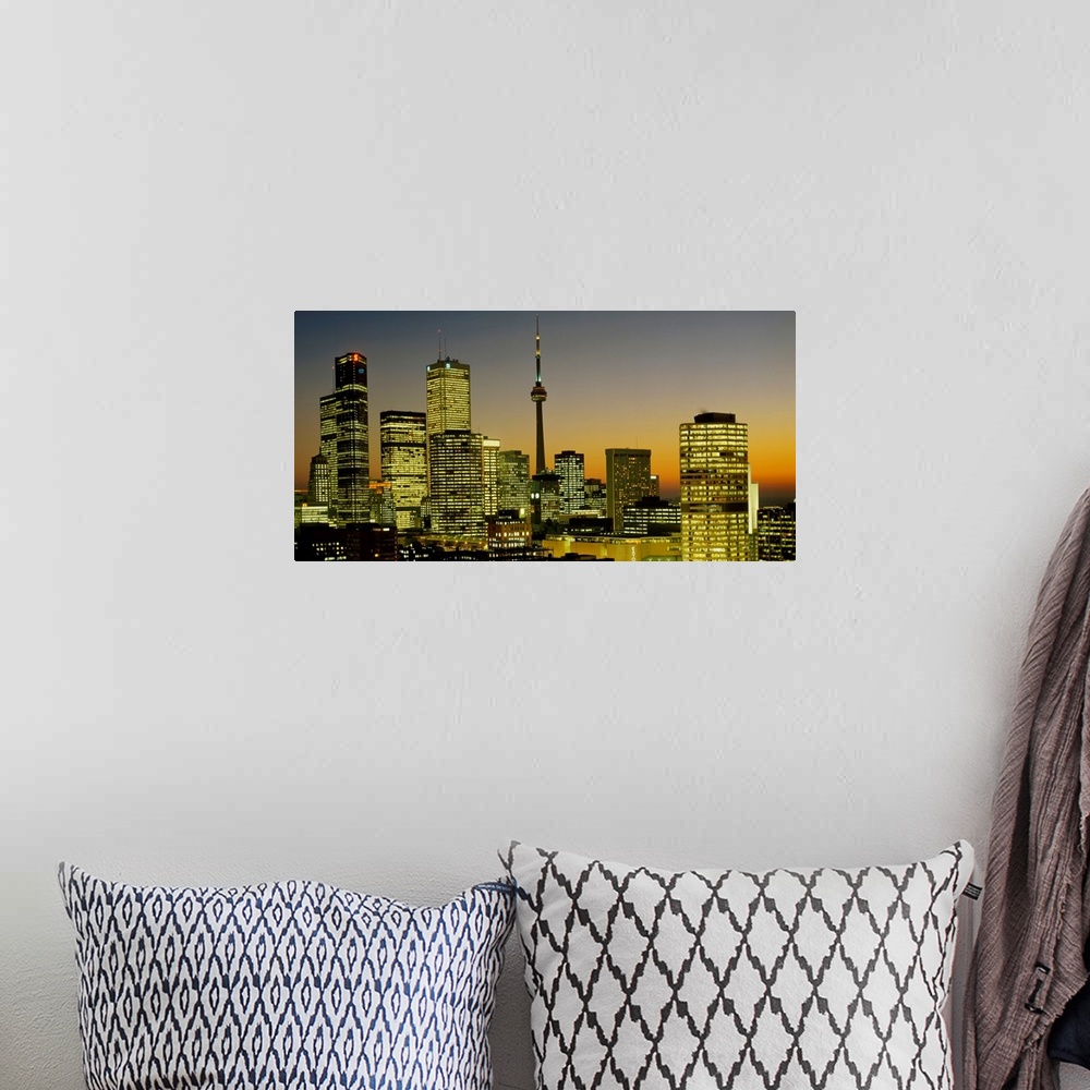 A bohemian room featuring Photograph of brightly lit buildings at night in Toronto, Canada, featuring Toronto Eaton Centre ...