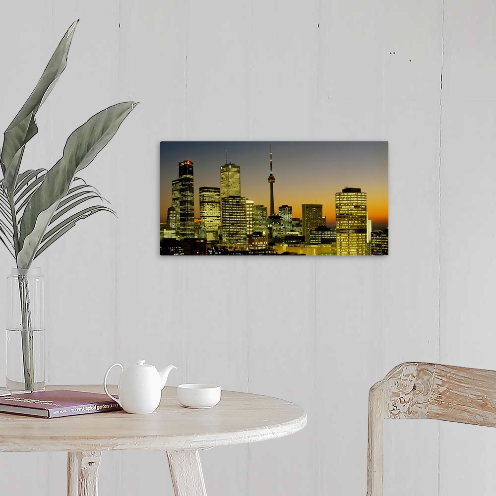 A farmhouse room featuring Photograph of brightly lit buildings at night in Toronto, Canada, featuring Toronto Eaton Centre ...