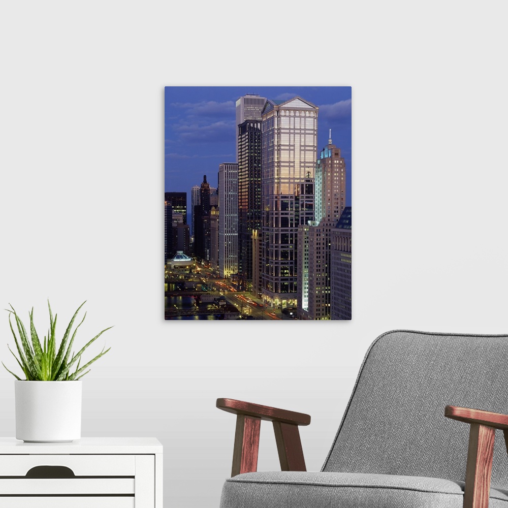 A modern room featuring Skyscrapers lit up at night, Chicago River, Chicago, Cook County, Illinois,