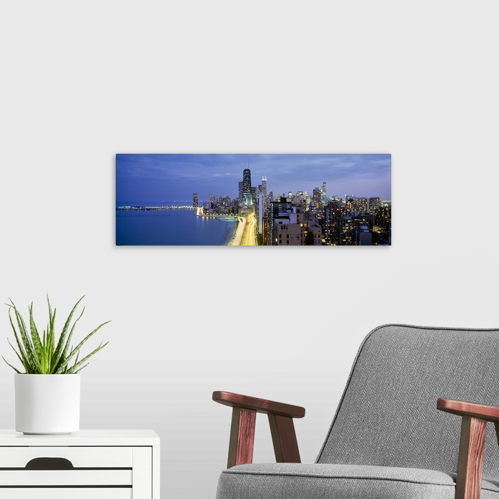 A modern room featuring Panoramic photograph of the Chicago skyline from Lake Shore Drive in Chicago, Illinois.