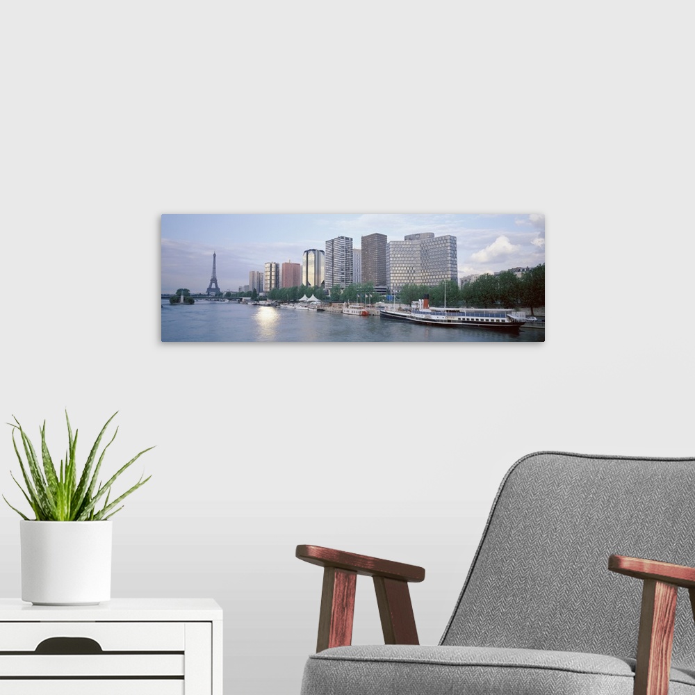 A modern room featuring Skyscrapers near a river, Paris, France