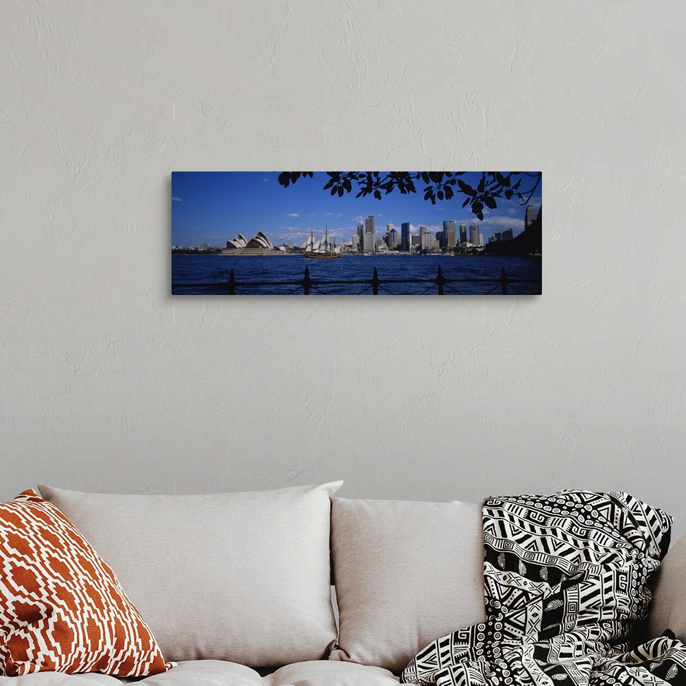 A bohemian room featuring Skyscrapers on the waterfront, Sydney Opera House, Sydney, New South Wales, Australia