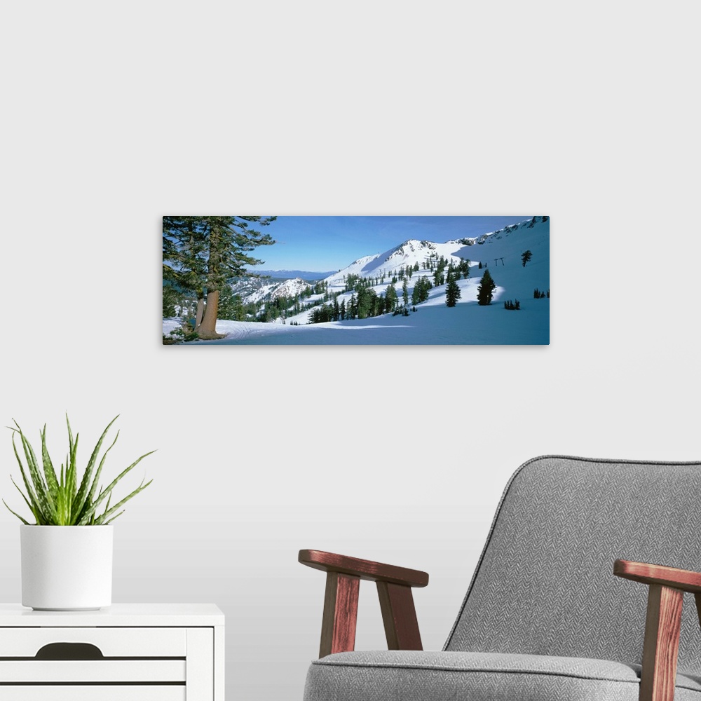 A modern room featuring Snow covered hills, Lake Tahoe
