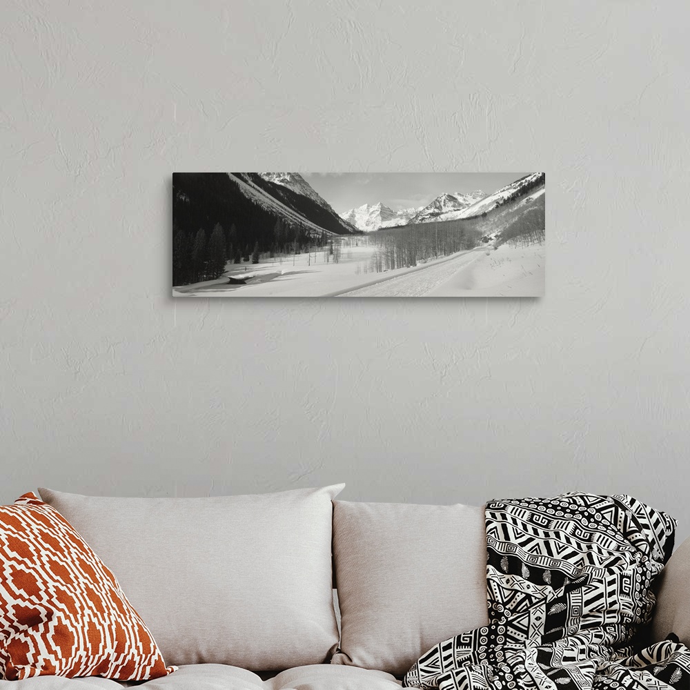 A bohemian room featuring Snow covered landscape, Maroon Bells, Colorado