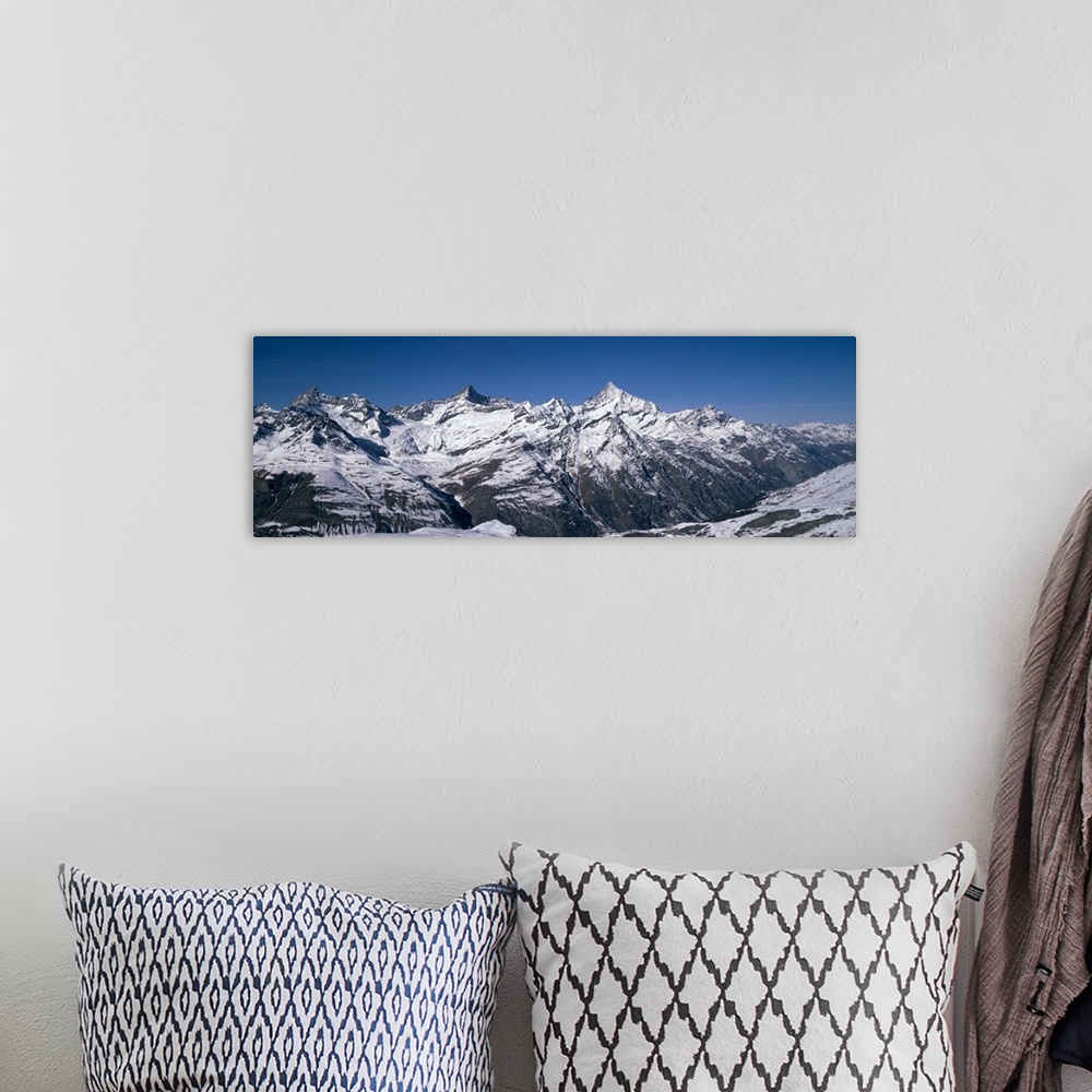 A bohemian room featuring Snow covered mountains at morning light, Gornergrat, Valais Canton, Switzerland