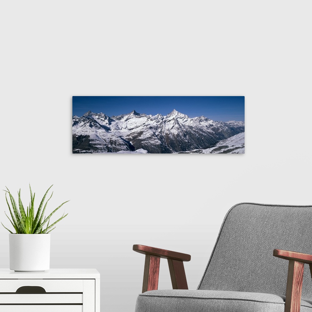 A modern room featuring Snow covered mountains at morning light, Gornergrat, Valais Canton, Switzerland