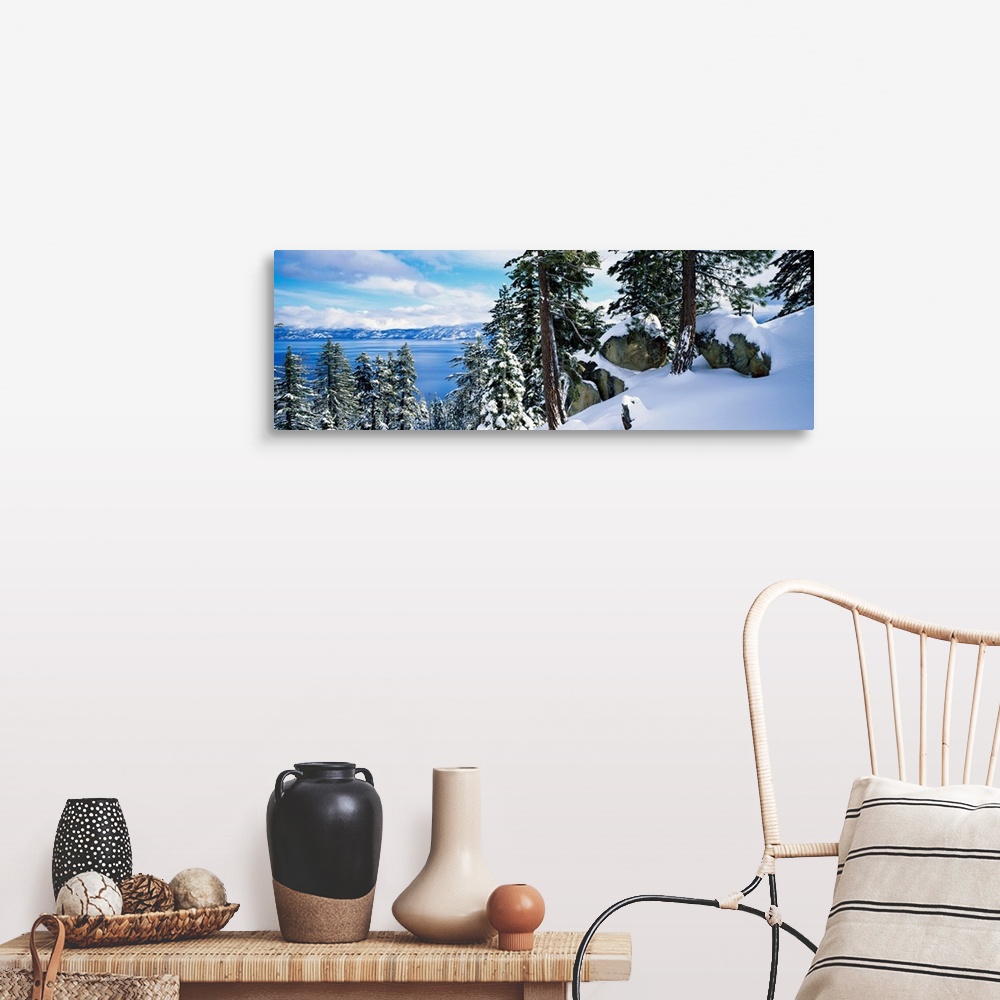 A farmhouse room featuring A landscape photograph taken from a mountain ridge in winter looking down into the scenic lake an...