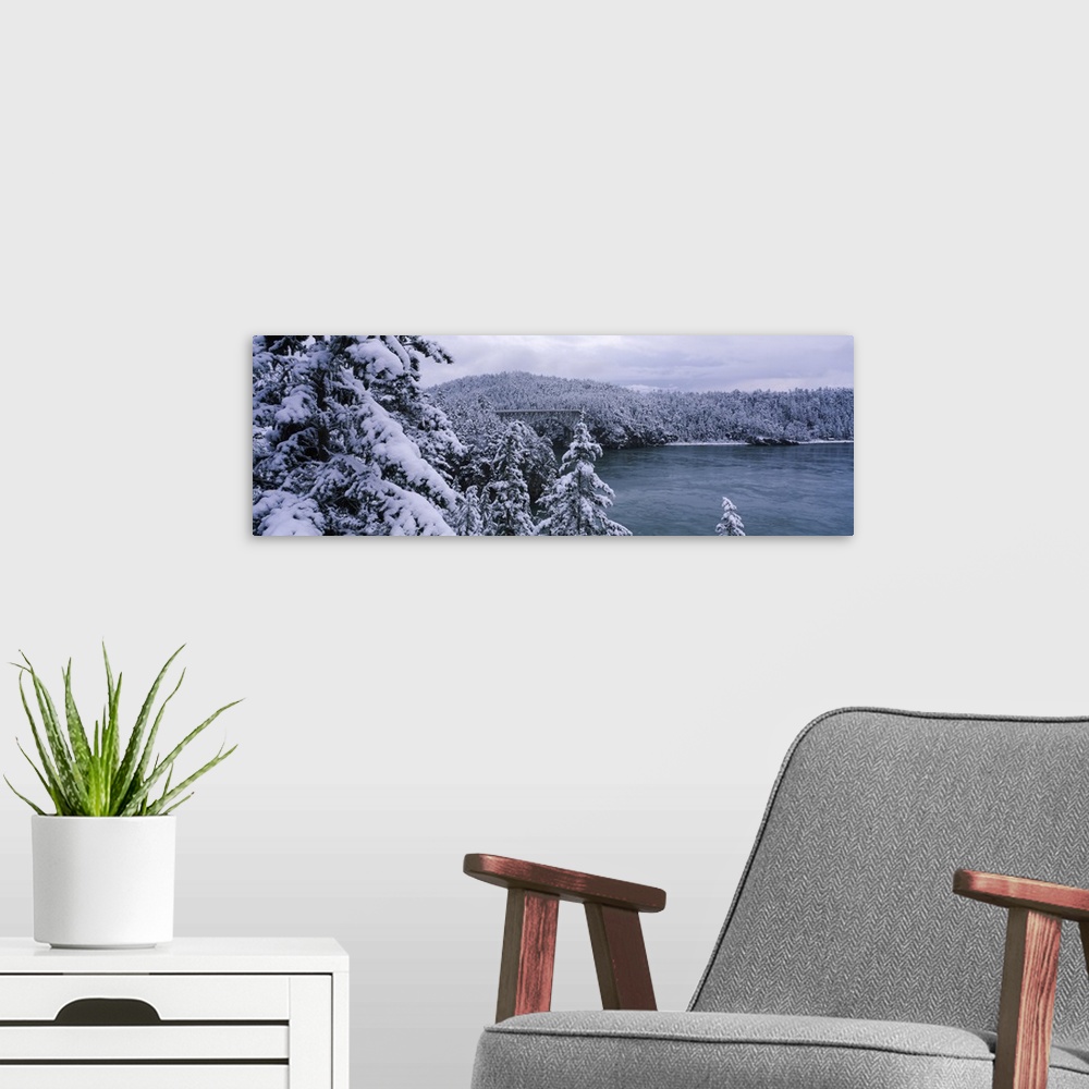 A modern room featuring Snow covered trees with a bridge in the background, Deception Pass Bridge, Deception Pass, Whidbe...