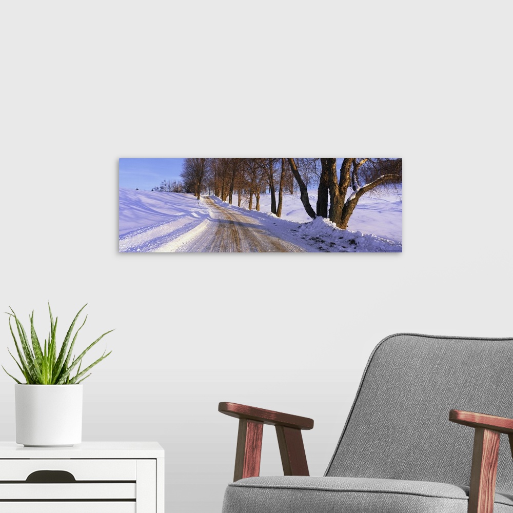 A modern room featuring Snowy Country Road