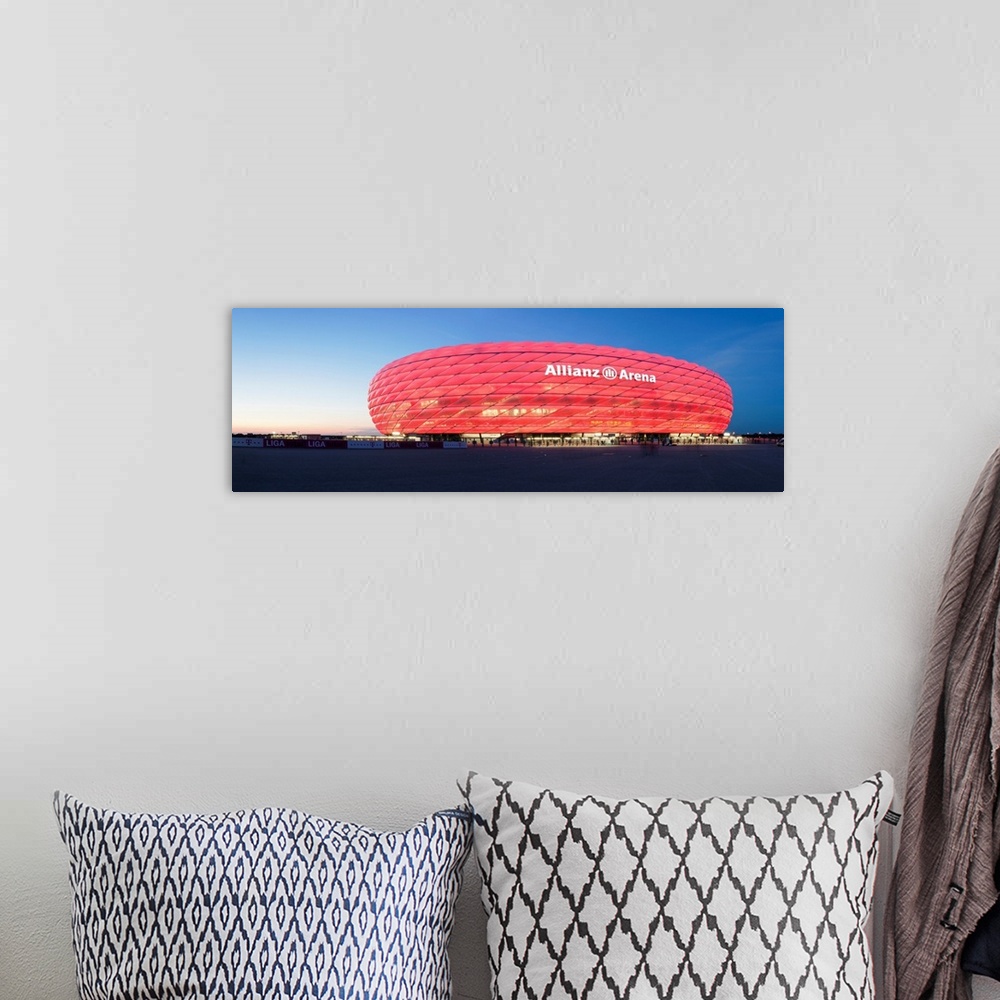 A bohemian room featuring Soccer stadium lit up at dusk, Allianz Arena, Munich, Bavaria, Germany