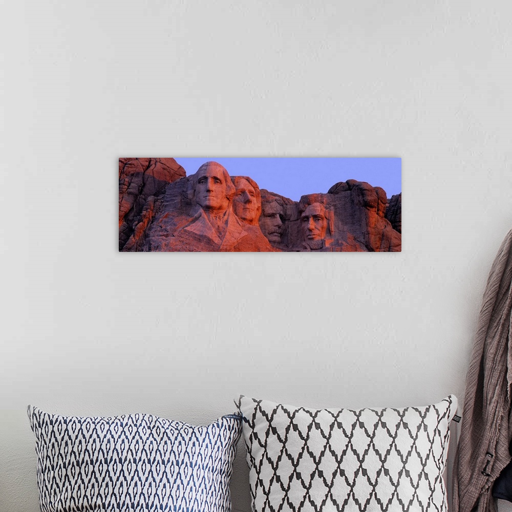 A bohemian room featuring Panoramic sculpture of Mount Rushmore which features presidents Washington, Jefferson, Lincoln an...