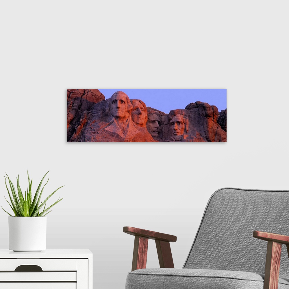 A modern room featuring Panoramic sculpture of Mount Rushmore which features presidents Washington, Jefferson, Lincoln an...