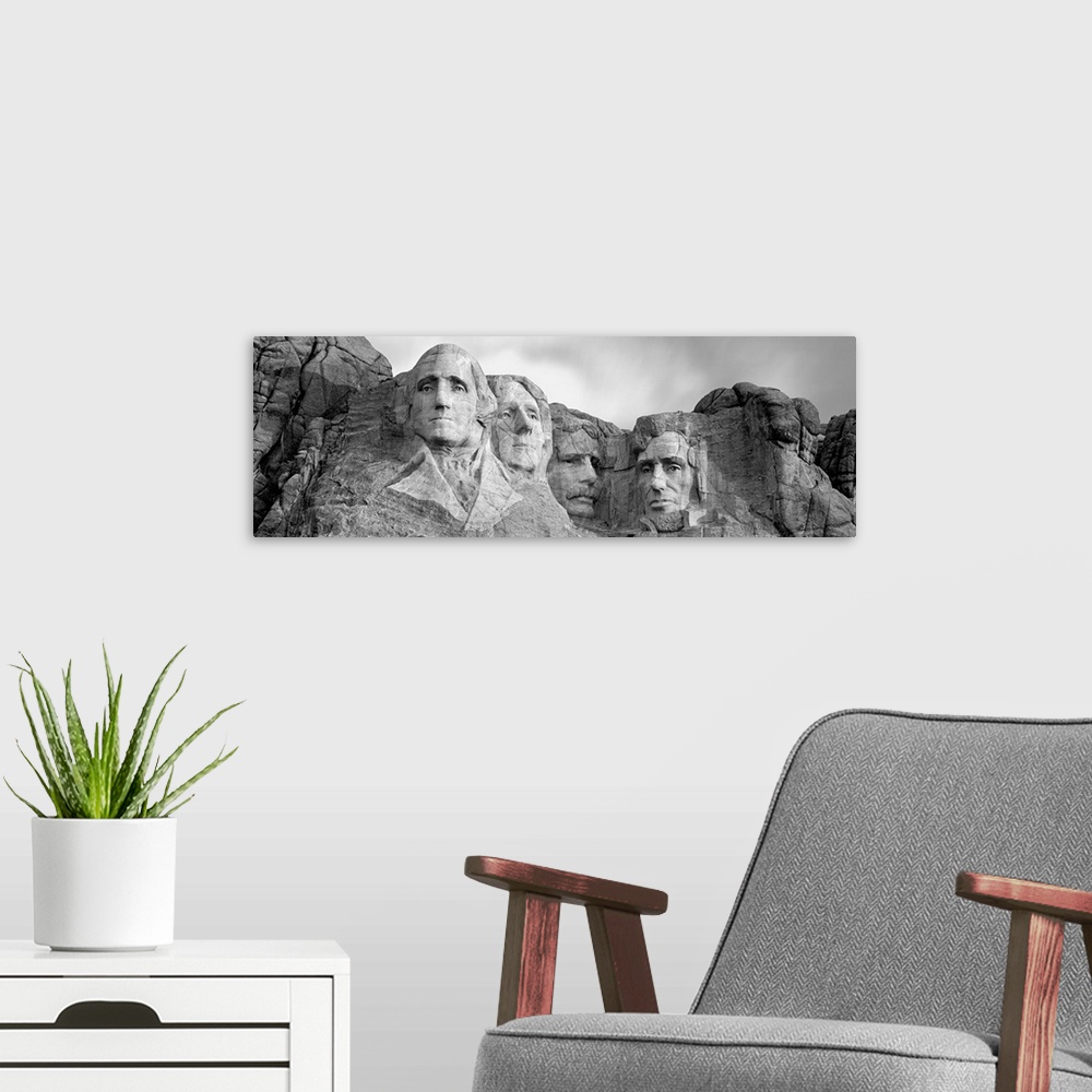 A modern room featuring Black and white panorama of Mount Rushmore, a granite sculpture in South Dakota that took 14 year...