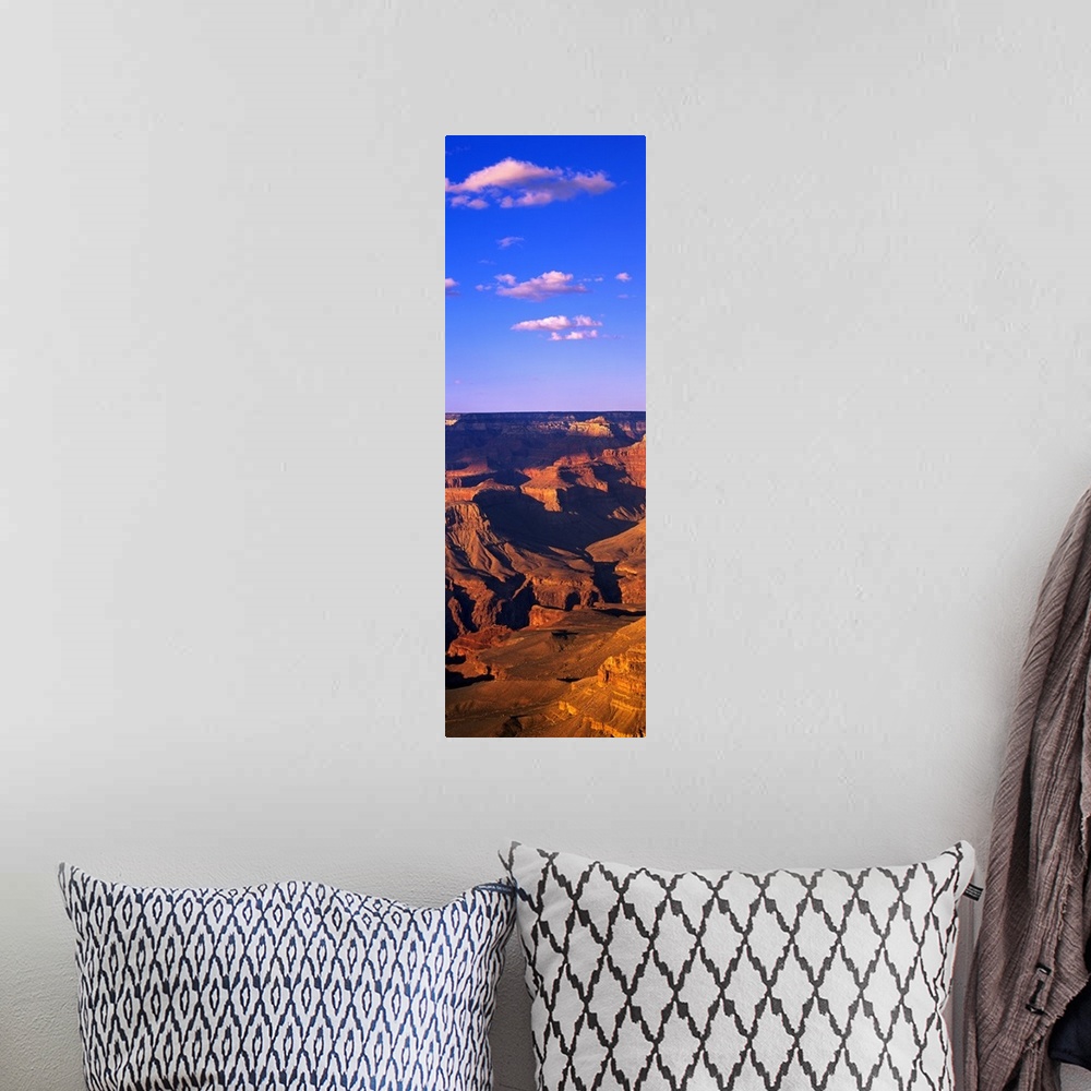 A bohemian room featuring This vertical panoramic print is a photograph taken of part of the Grand Canyon on a sunny day.