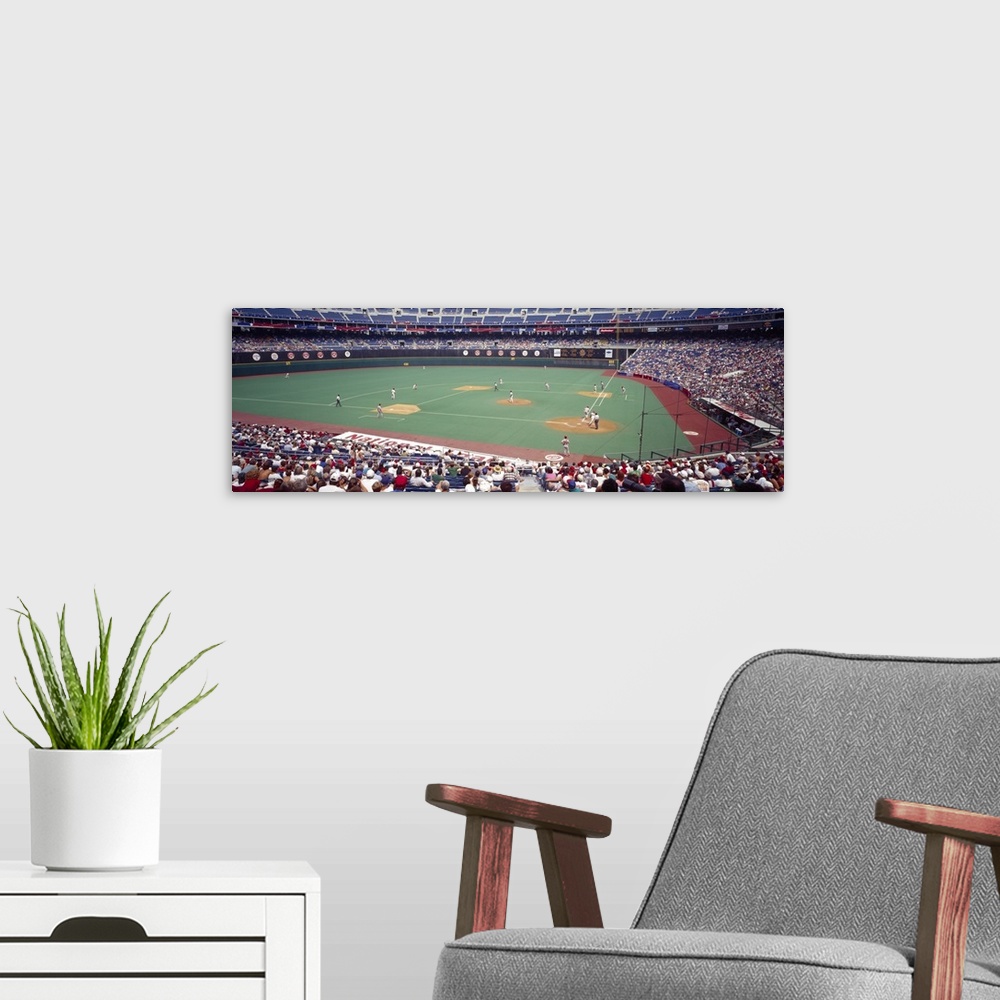 A modern room featuring Spectator watching a baseball match Veterans Stadium Philadelphia Pennsylvania