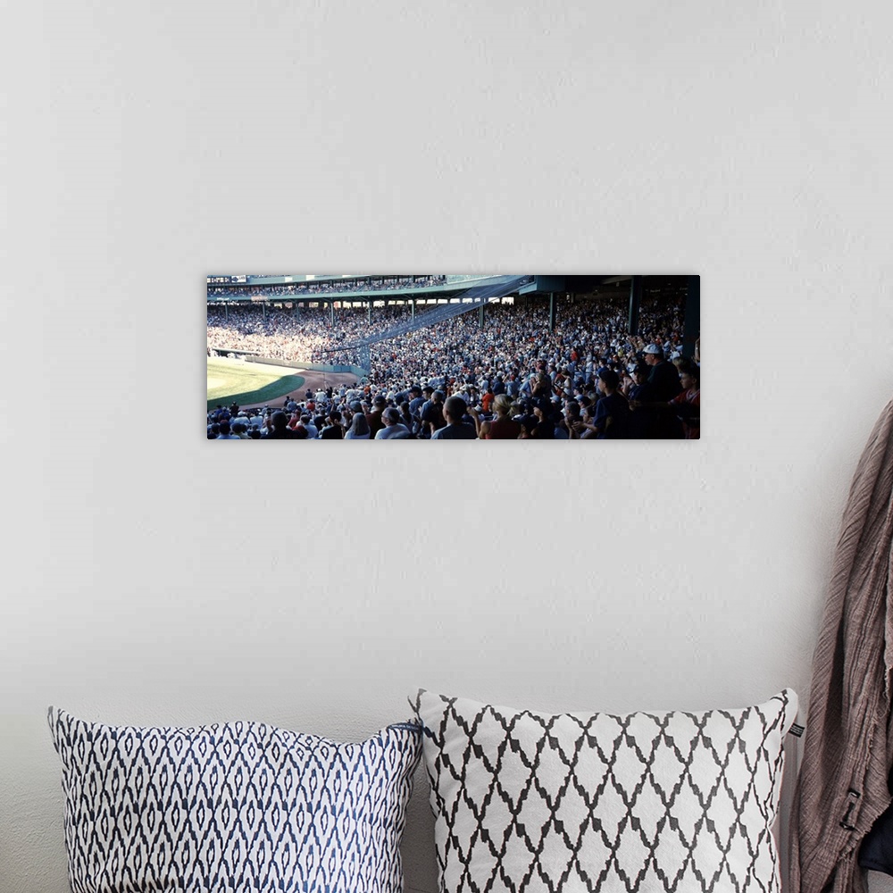 A bohemian room featuring Panoramic, big photograph of packed stands of fans watching a baseball game at Fenway Park, in Bo...