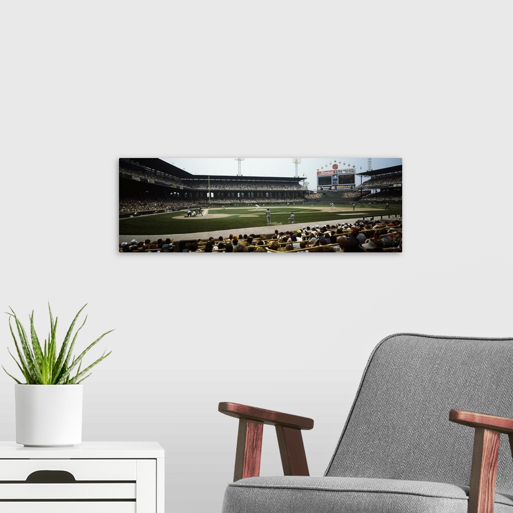 A modern room featuring Spectators watching a baseball match in a stadium U.S. Cellular Field Chicago Cook County Illinois