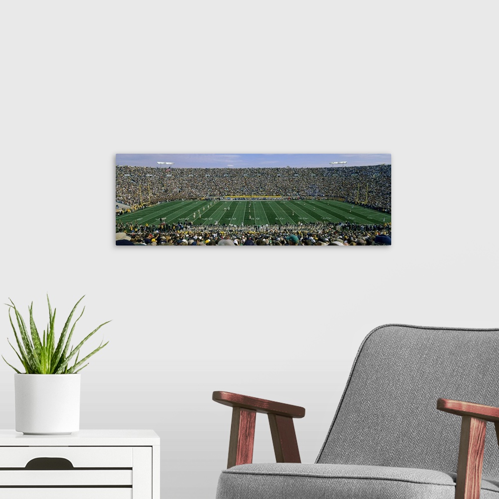 A modern room featuring Spectators watching a football match, Notre Dame Stadium, South Bend, Indiana