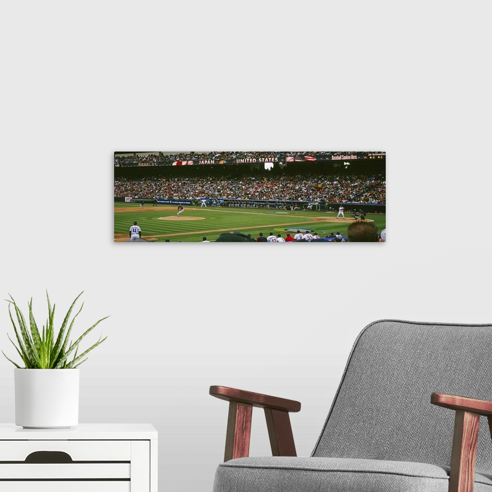 A modern room featuring Spectators watching baseball game in a baseball stadium, Japan vs. United States, World Baseball ...