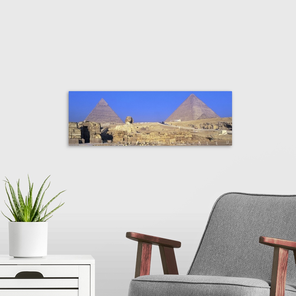 A modern room featuring Sphinx Giza Pyramids Egypt