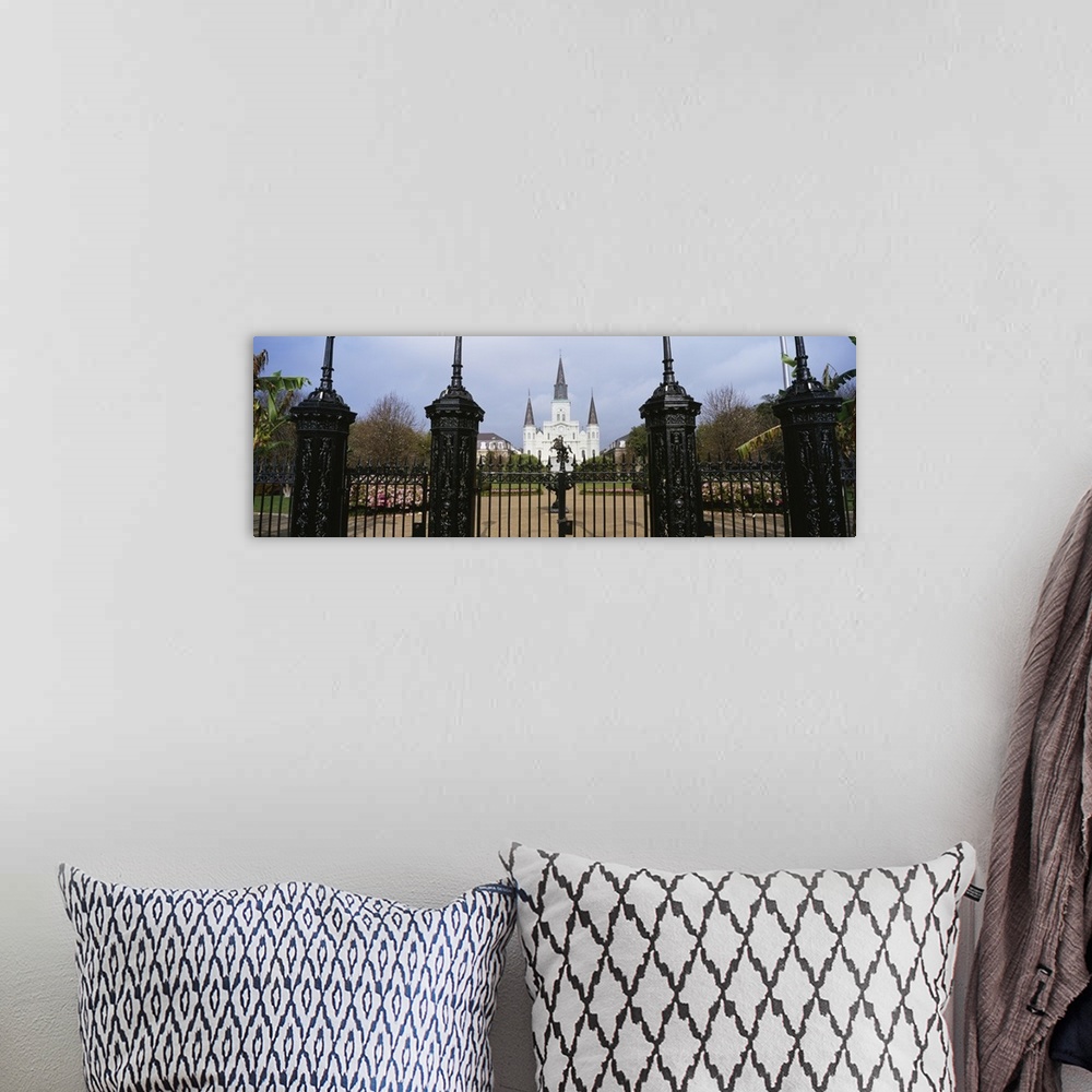 A bohemian room featuring Panoramic photo on canvas of a big house of worship that is seen through iron fences located in L...