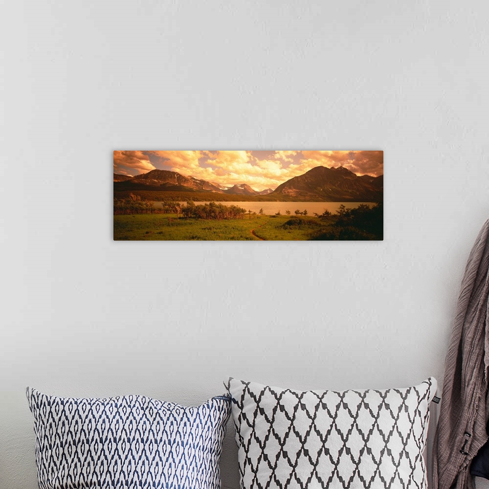 A bohemian room featuring Sunset over the Rocky Mountains at Saint Mary Lake in Glacier Nation Park, Montana.