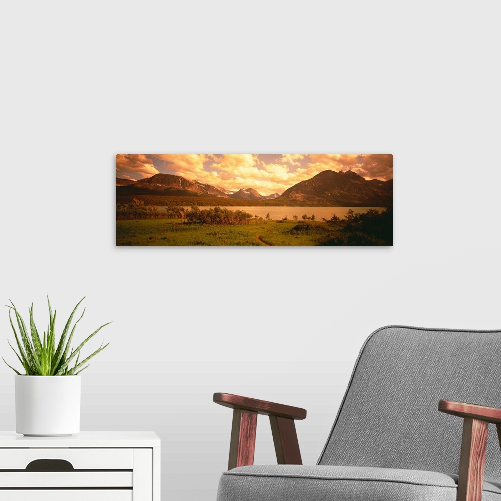A modern room featuring Sunset over the Rocky Mountains at Saint Mary Lake in Glacier Nation Park, Montana.
