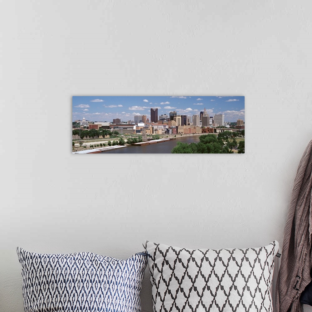 A bohemian room featuring Panoramic photo on canvas of a cityscape in Minnesota along a waterfront during the daytime.