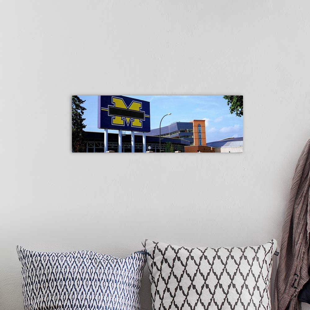 A bohemian room featuring Stadium of a university, Michigan Stadium, University of Michigan, Ann Arbor, Michigan