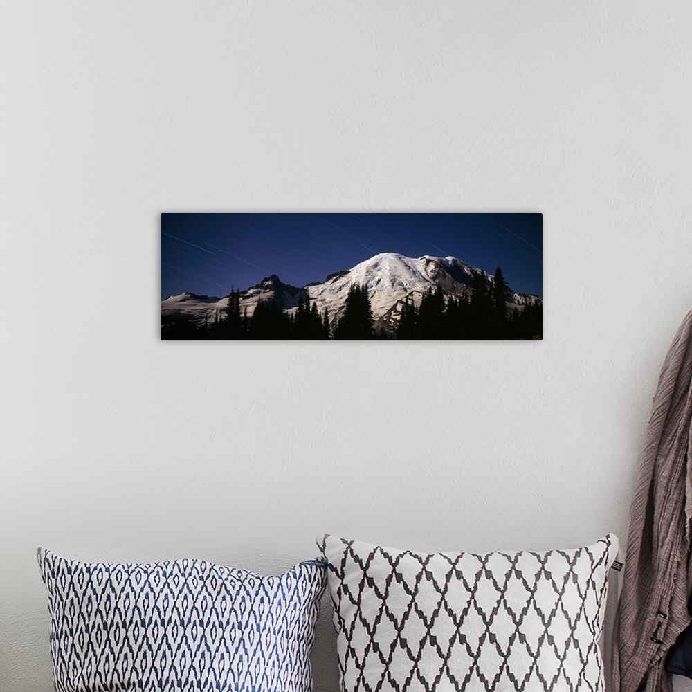 A bohemian room featuring Star trails over mountains, Mt Rainier, Washington State,