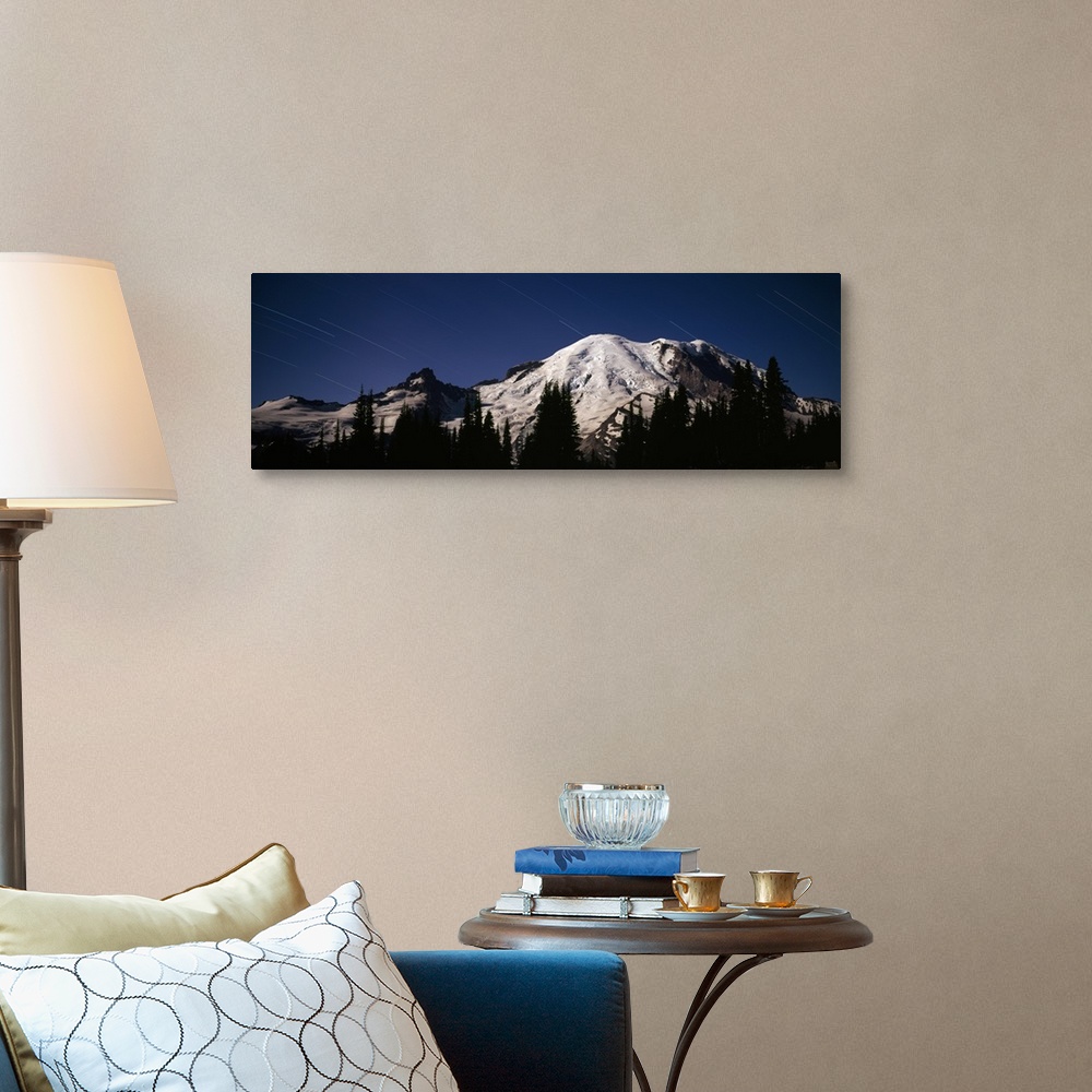 A traditional room featuring Star trails over mountains, Mt Rainier, Washington State,