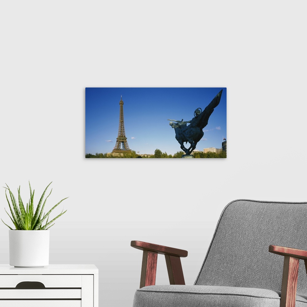 A modern room featuring Statue Eiffel Tower Paris France