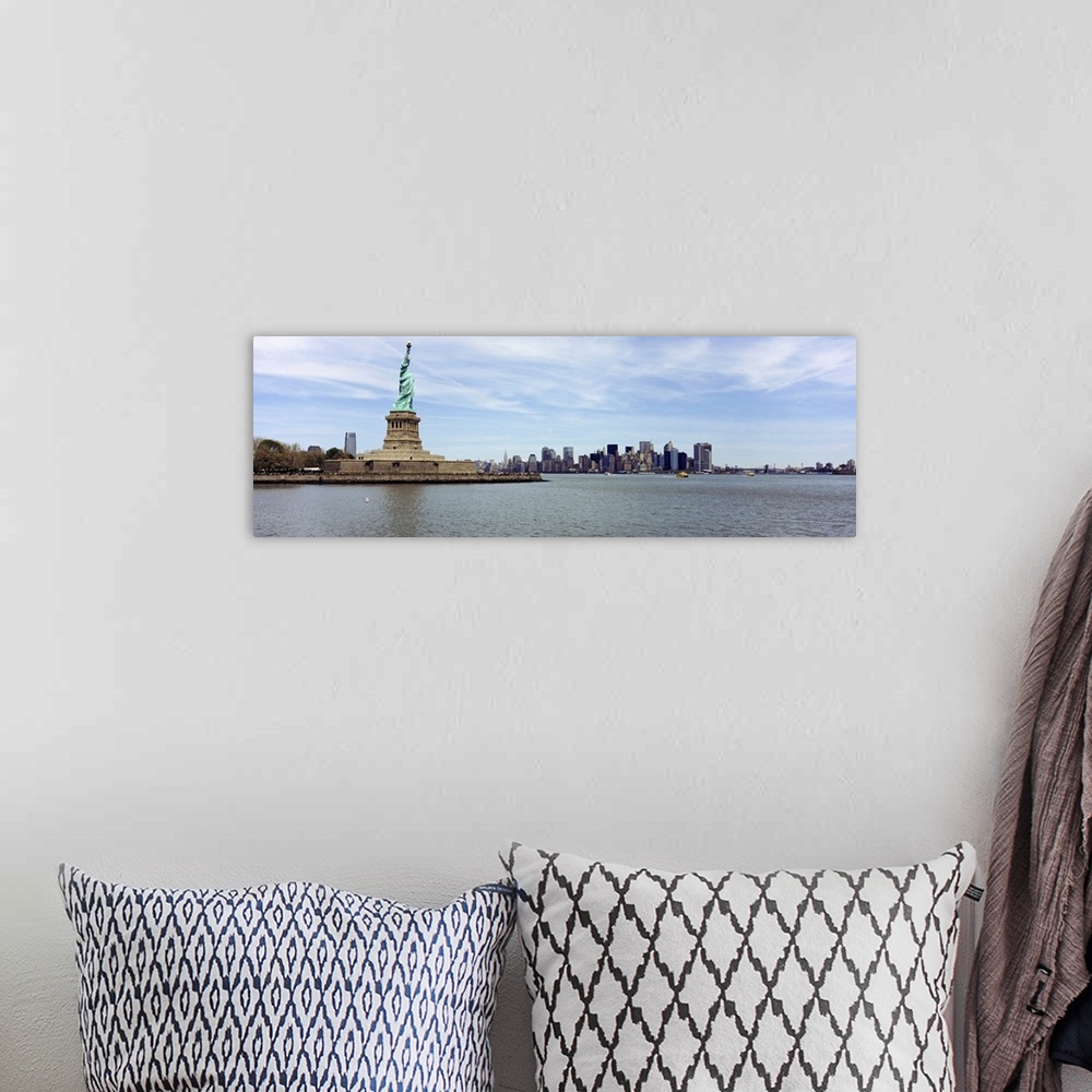 A bohemian room featuring Big panoramic photo on canvas of the Statue of Liberty with the NYC cityscape in the distance.