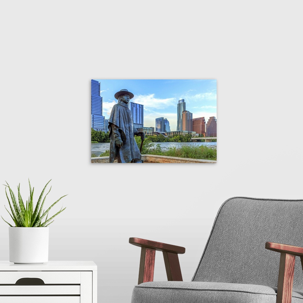 A modern room featuring Statue of Stevie Ray Vaughan on the shore of Lady Bird Lake in downtown Austin, Texas, USA.