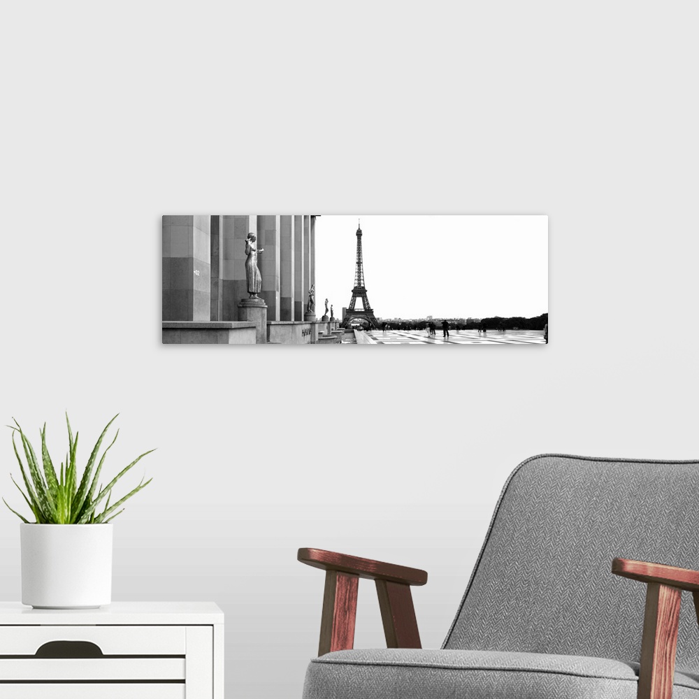 A modern room featuring Statues at a palace with a tower in the background, Eiffel Tower, Place Du Trocadero, Paris, Ile-...