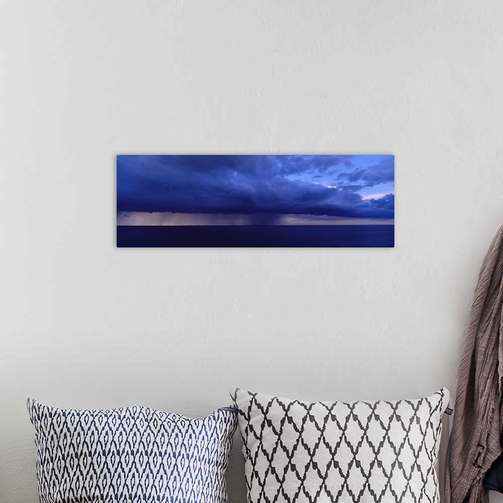 A bohemian room featuring Storm cloud over the sea