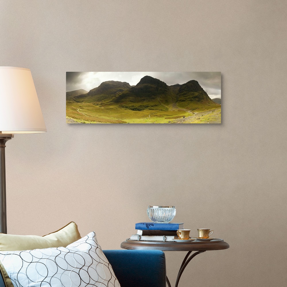 A traditional room featuring Storm clouds over a mountain range, Three Sisters of Glen Coe, Scotland