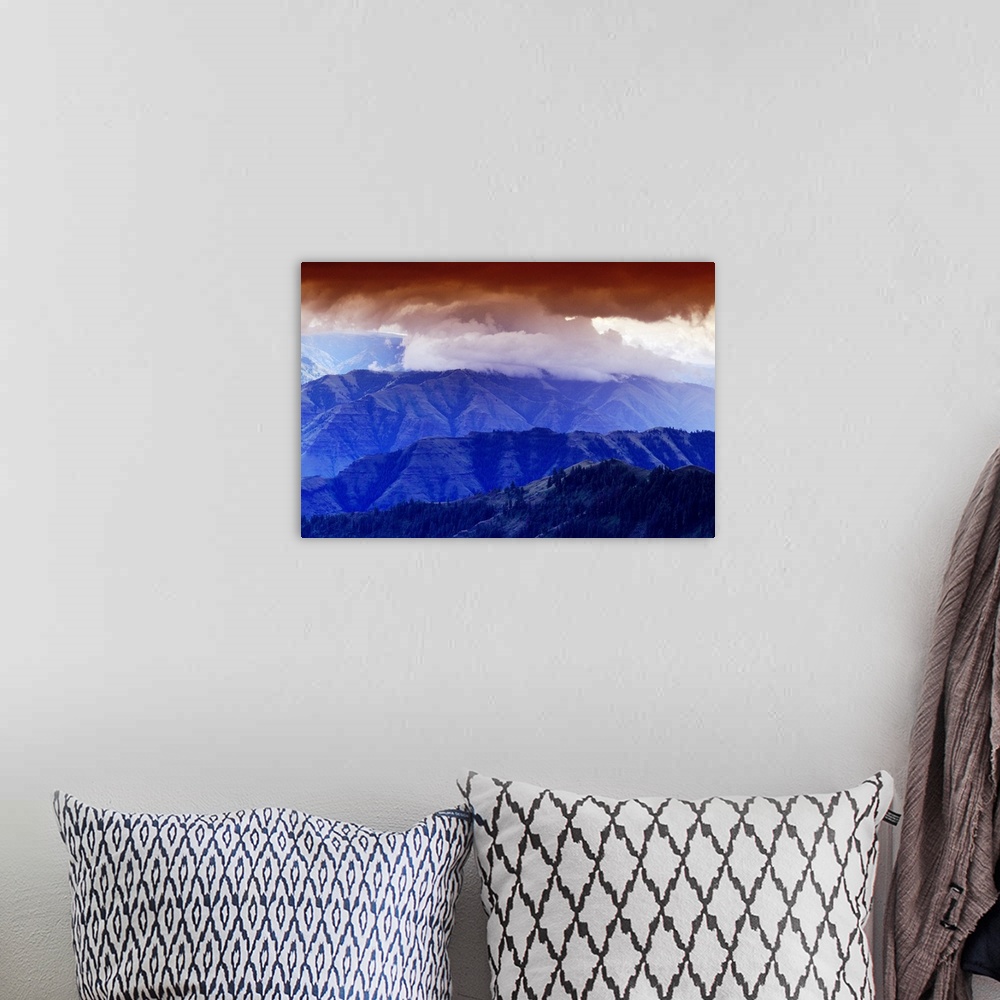 A bohemian room featuring Storm Clouds Over Hells Canyon
